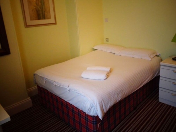 Imagen de la habitación del Hotel Aron Guest House. Foto 7