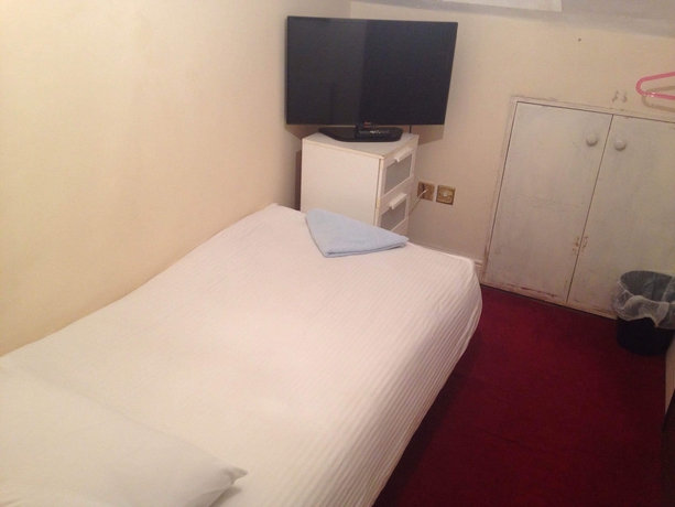 Imagen de la habitación del Hotel Aron Guest House. Foto 8