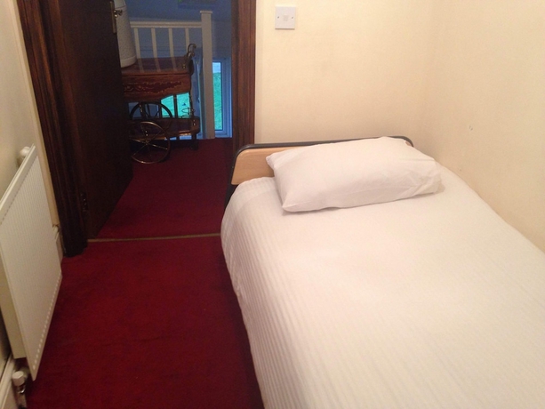 Imagen de la habitación del Hotel Aron Guest House. Foto 9