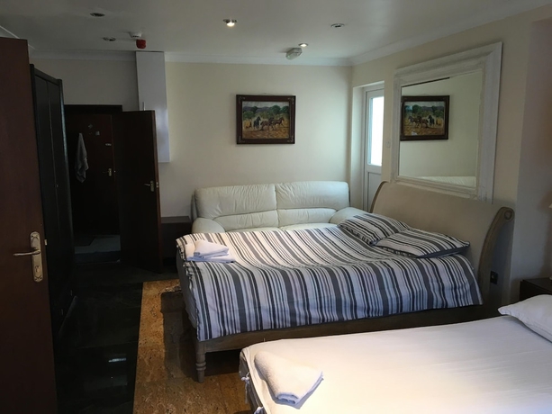 Imagen de la habitación del Hotel Aron Guest House. Foto 10