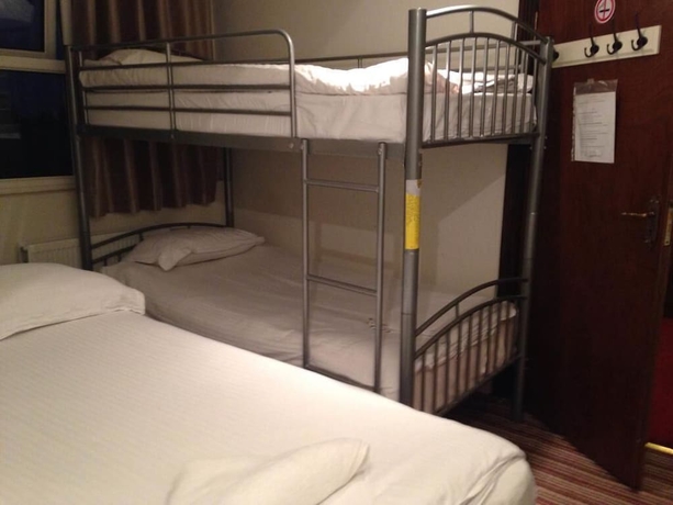 Imagen de la habitación del Hotel Aron Guest House. Foto 15