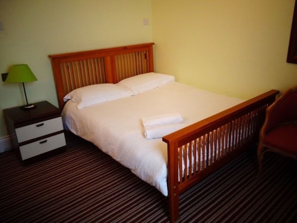 Imagen de la habitación del Hotel Aron Guest House. Foto 16