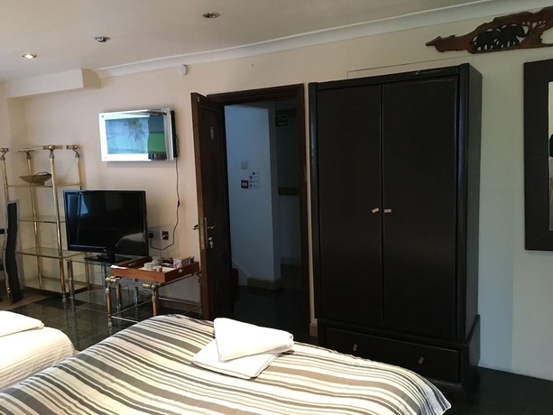 Imagen de la habitación del Hotel Aron Guest House 'Second Home'. Foto 11