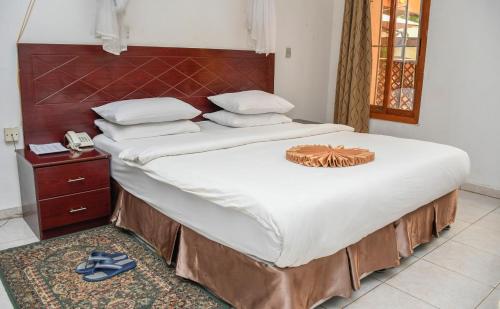 Imagen de la habitación del Hotel Aron International. Foto 18