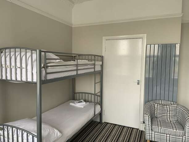 Imagen de la habitación del Hotel Arona Guest. Foto 13