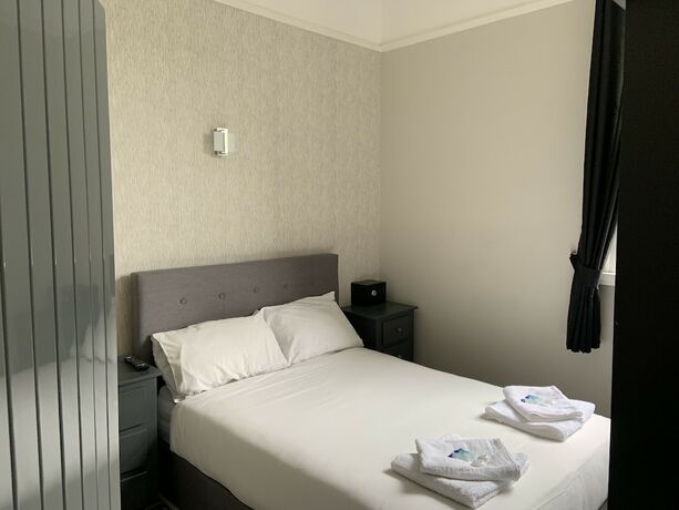 Imagen de la habitación del Hotel Arona Guest. Foto 15