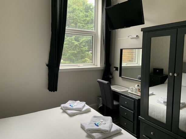 Imagen de la habitación del Hotel Arona Guest. Foto 16