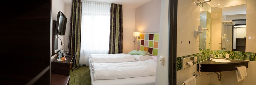 Imagen de la habitación del Hotel Arooma. Foto 3