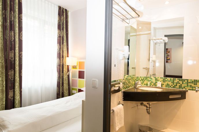 Imagen de la habitación del Hotel Arooma. Foto 4