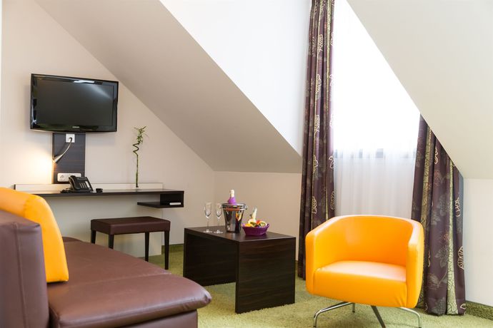 Imagen de la habitación del Hotel Arooma. Foto 7