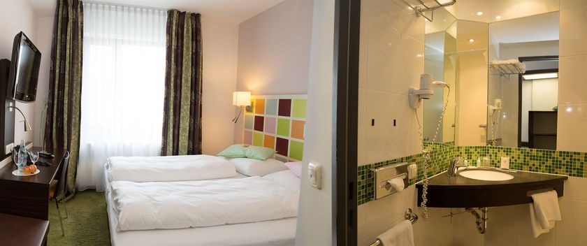 Imagen de la habitación del Hotel Arooma. Foto 12