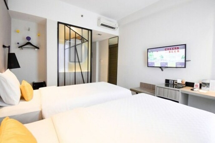 Imagen de la habitación del Hotel Arosa Jakarta. Foto 23