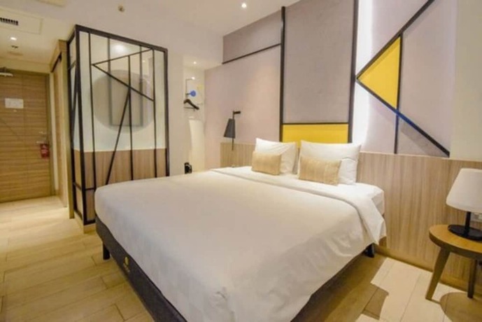 Imagen de la habitación del Hotel Arosa Jakarta. Foto 28