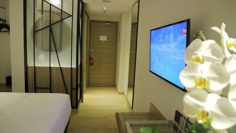 Imagen de la habitación del Hotel Arosa Jakarta. Foto 30