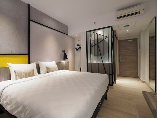 Imagen de la habitación del Hotel Arosa Jakarta. Foto 31