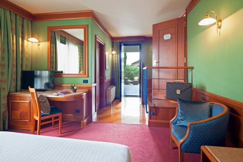 Imagen de la habitación del Hotel Arosio. Foto 7