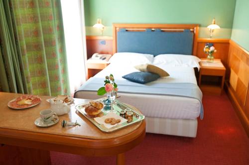 Imagen de la habitación del Hotel Arosio. Foto 9