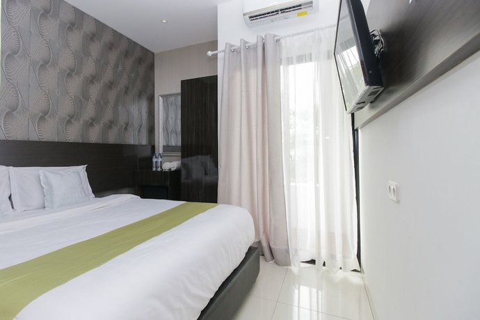 Imagen de la habitación del Hotel Arotel Bsd. Foto 6