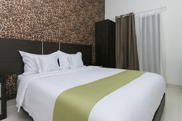 Imagen de la habitación del Hotel Arotel Bsd. Foto 7