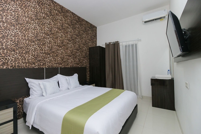 Imagen de la habitación del Hotel Arotel Bsd. Foto 8