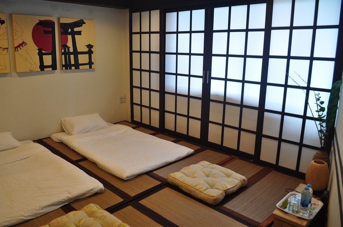 Imagen de la habitación del Hotel Around The World Bandb. Foto 2