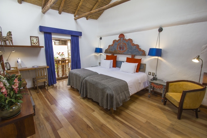 Imagen de la habitación del Hotel Arqueologo Exclusive Selection - Casa Peralta. Foto 11