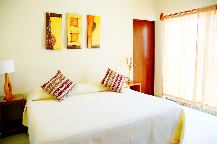 Imagen de la habitación del Hotel Arrecifes Suites. Foto 3