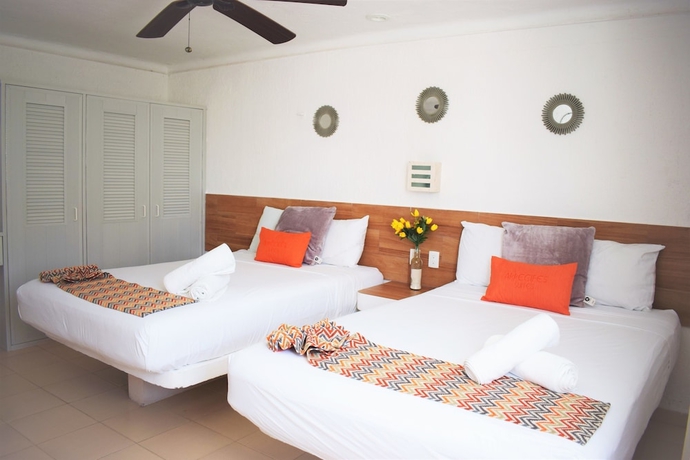 Imagen de la habitación del Hotel Arrecifes Suites. Foto 5