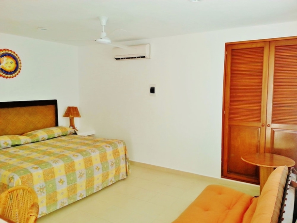 Imagen de la habitación del Hotel Arrecifes Suites. Foto 9