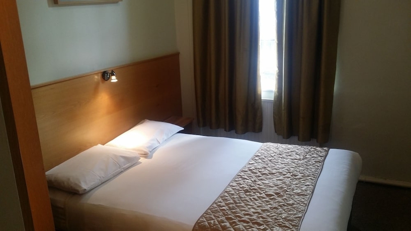Imagen de la habitación del Hotel Arriva, Londres. Foto 17