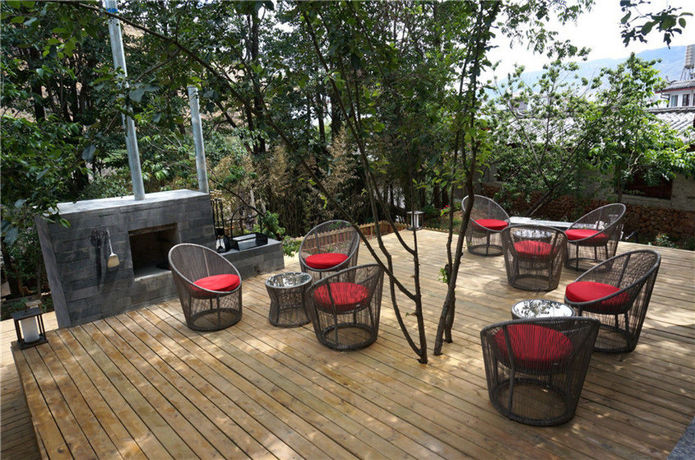Imagen del bar/restaurante del Hotel Arro Khampa By Zinc Journey Lijiang. Foto 7