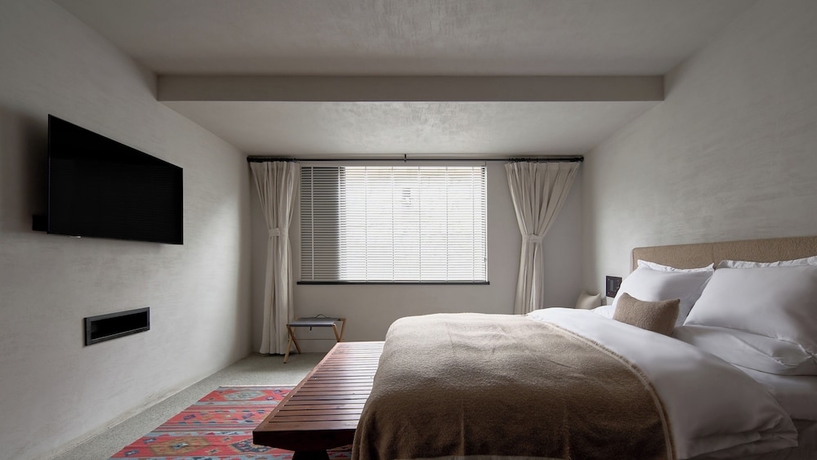 Imagen de la habitación del Hotel Arro Khampa Lhasa. Foto 5