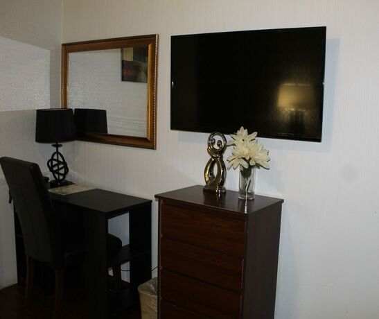 Imagen de la habitación del Hotel Arrowhead Motel. Foto 13