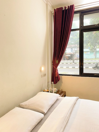 Imagen de la habitación del Hotel Ars Inn Yogyakarta. Foto 9