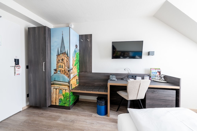 Imagen de la habitación del Hotel Art Aachen. Foto 10