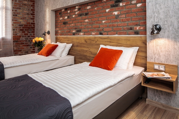 Imagen de la habitación del Hotel Art And Garden Residence. Foto 6