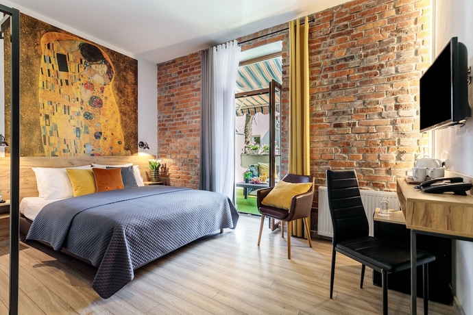 Imagen de la habitación del Hotel Art And Garden Residence. Foto 7