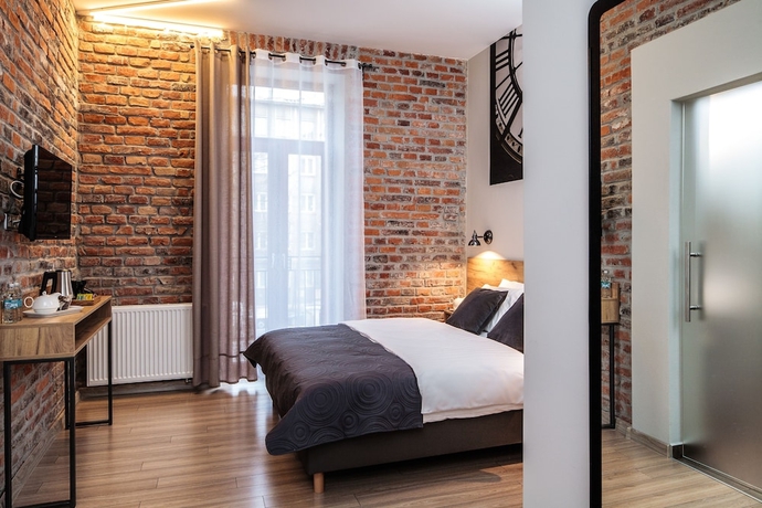 Imagen de la habitación del Hotel Art And Garden Residence. Foto 8