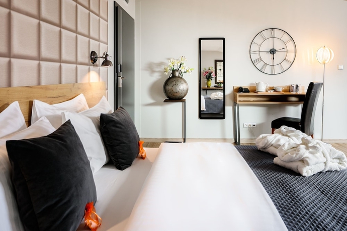 Imagen de la habitación del Hotel Art And Garden Residence. Foto 12