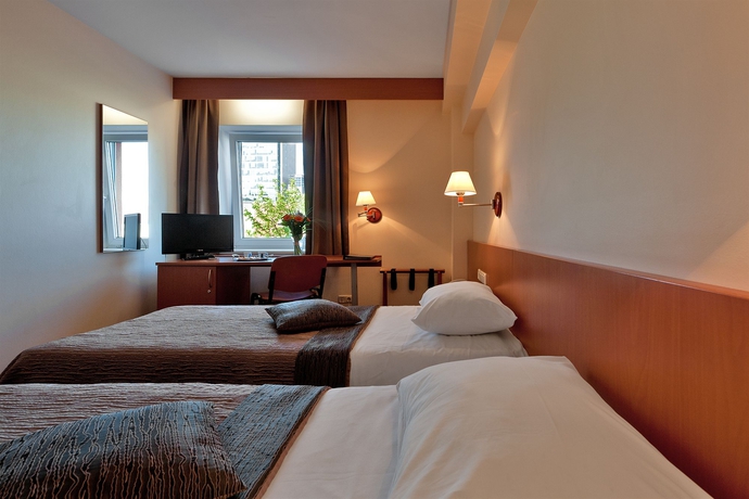 Imagen de la habitación del Hotel Art City Inn. Foto 6