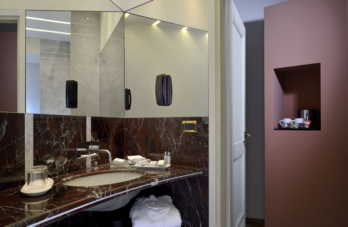 Imagen de la habitación del Hotel Art Commercianti. Foto 3