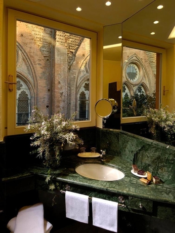 Imagen de la habitación del Hotel Art Commercianti. Foto 4