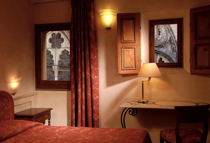 Imagen de la habitación del Hotel Art Commercianti. Foto 5