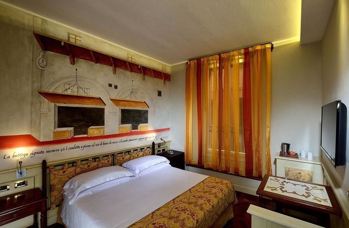Imagen de la habitación del Hotel Art Commercianti. Foto 7