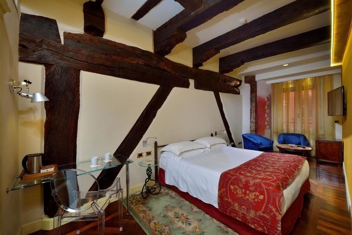 Imagen de la habitación del Hotel Art Commercianti. Foto 8