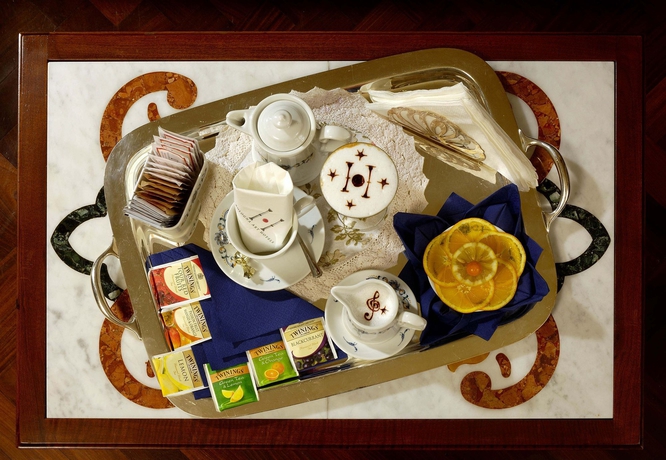 Imagen de la habitación del Hotel Art Commercianti. Foto 11