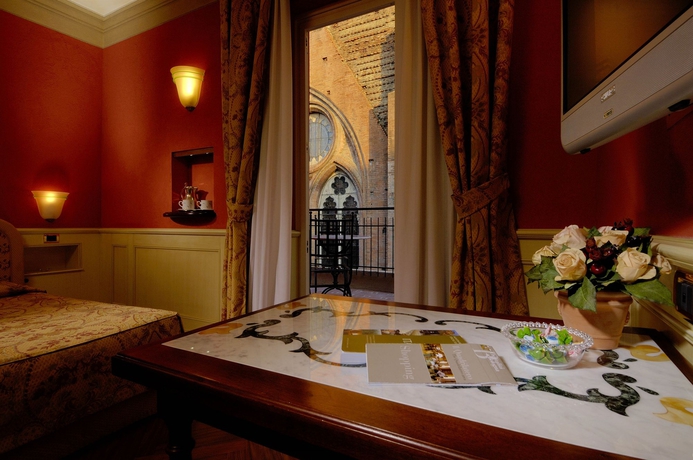 Imagen de la habitación del Hotel Art Commercianti. Foto 13