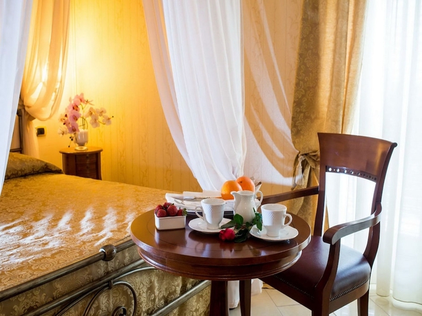 Imagen de la habitación del Hotel Art Hotel Diamond Naxos Taormina. Foto 12