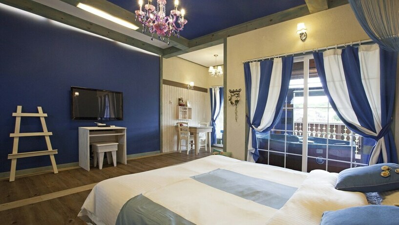 Imagen de la habitación del Hotel Art In Tiara. Foto 25