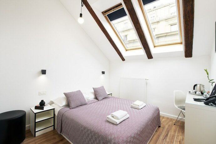 Imagen de la habitación del Hotel Art Like. Foto 17